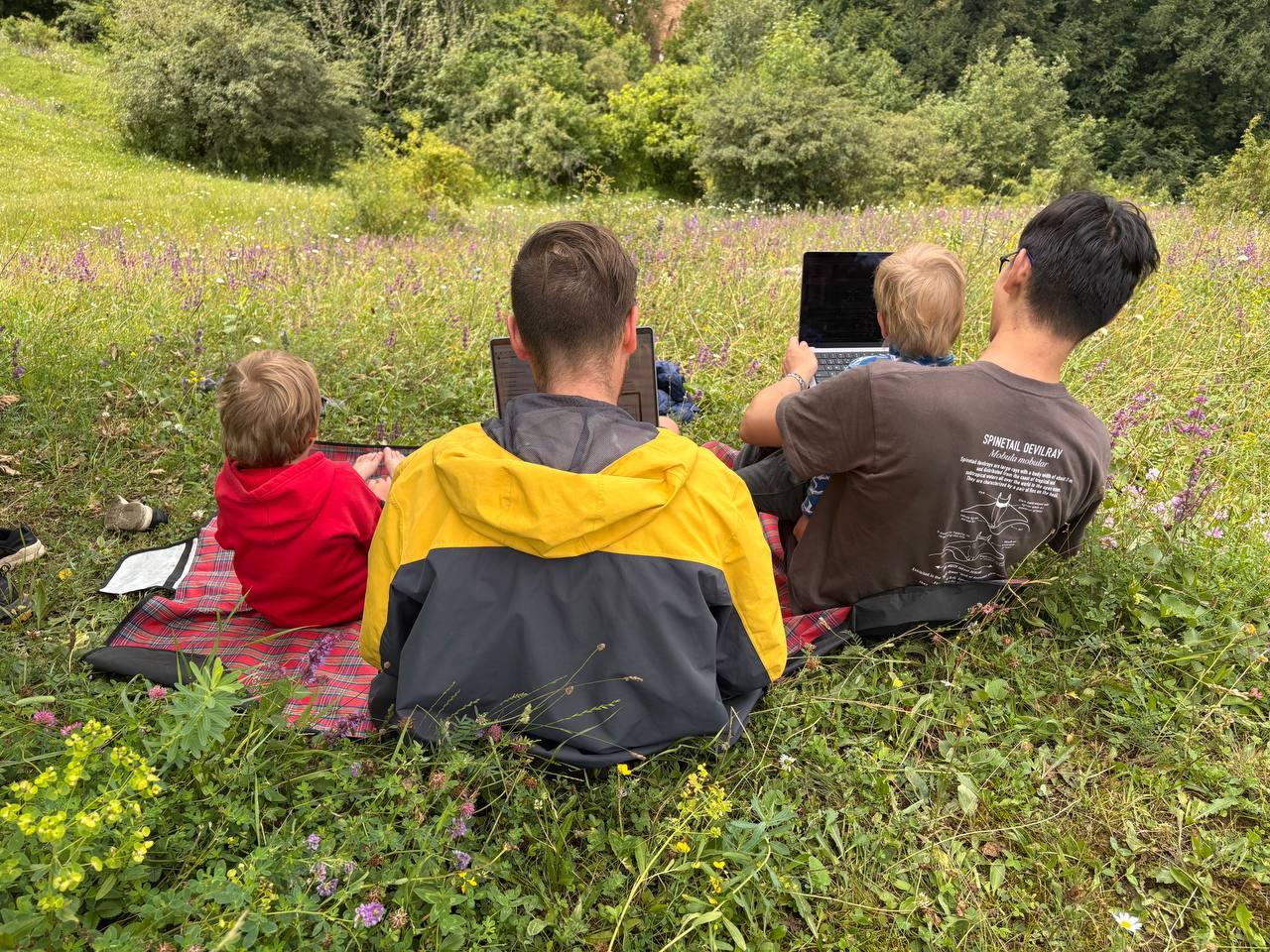 iMate team coding with kids in the mountains